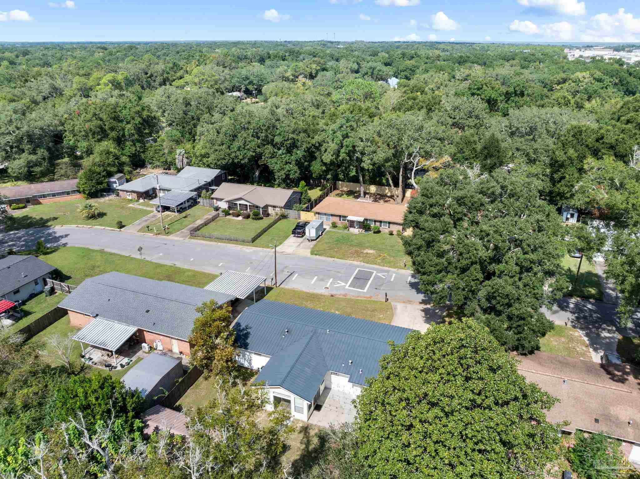 2969 Sky Crest Drive Pensacola, FL 32514 - Photo 42 of 50 an aerial view of a house with a yard