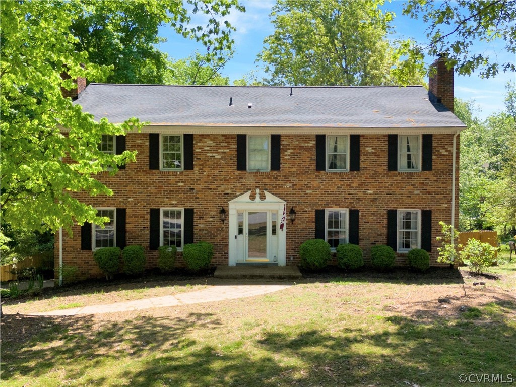 3933 Cresthill Road Chester, VA 23831 - Photo 1 of 49 front view of a house with a yard