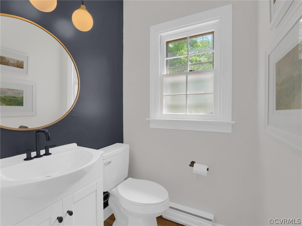 3933 Cresthill Road Chester, VA 23831 - Photo 26 of 49 a bathroom with a sink a toilet and a mirror