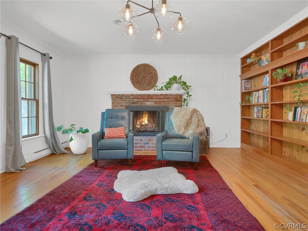 3933 Cresthill Road Chester, VA 23831 - Photo 29 of 49 a living room with furniture and a fireplace