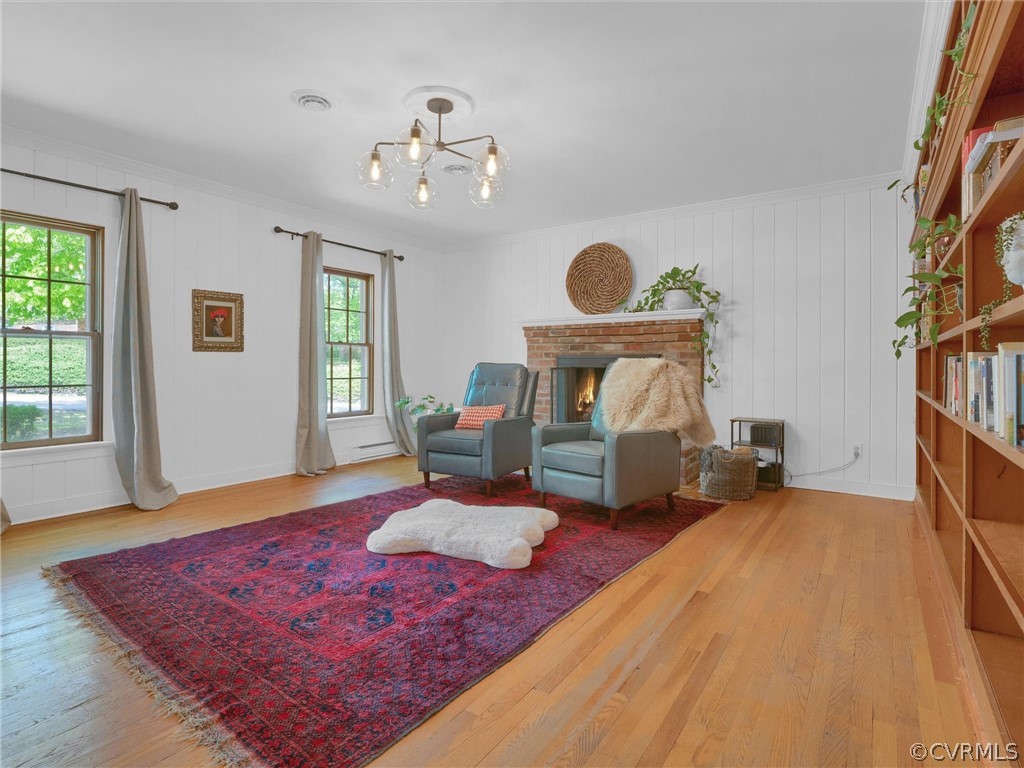 3933 Cresthill Road Chester, VA 23831 - Photo 30 of 49 a living room with furniture and a fireplace