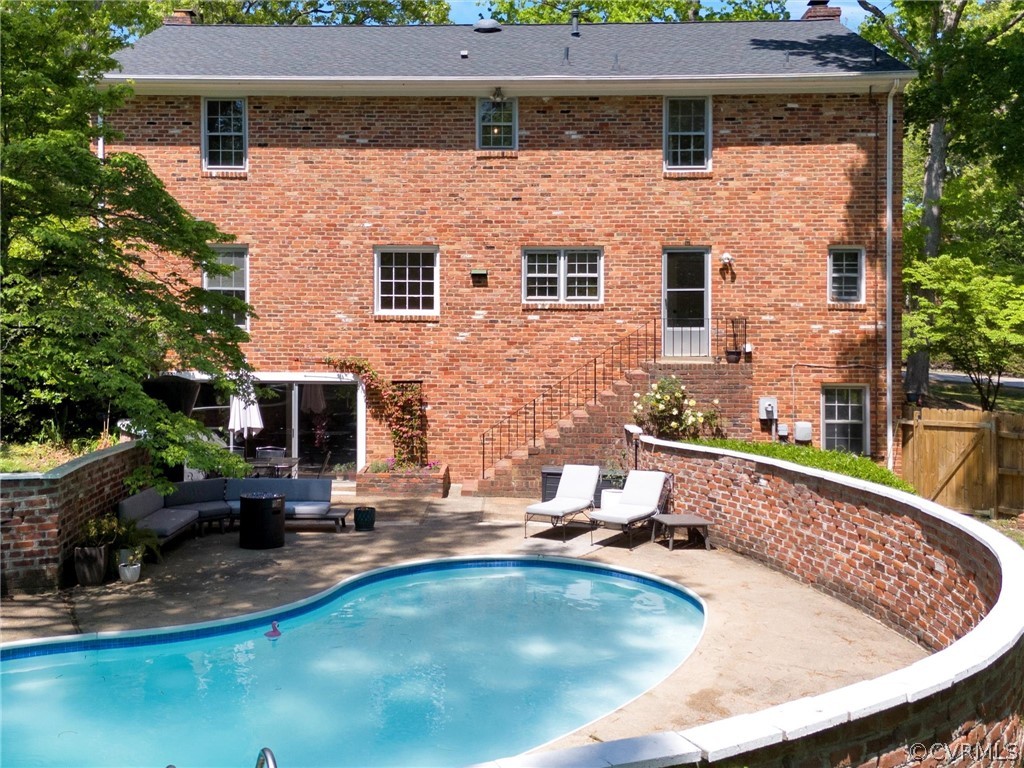 3933 Cresthill Road Chester, VA 23831 - Photo 3 of 49 a view of a house with pool and chairs