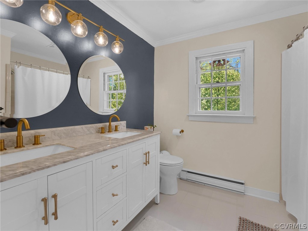 3933 Cresthill Road Chester, VA 23831 - Photo 32 of 49 a bathroom with a granite countertop toilet a sink and a mirror