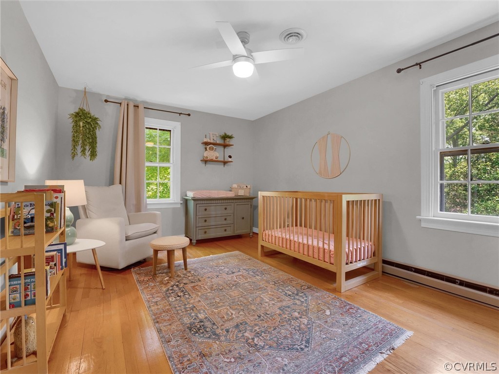 3933 Cresthill Road Chester, VA 23831 - Photo 33 of 49 a living room with furniture and a rug