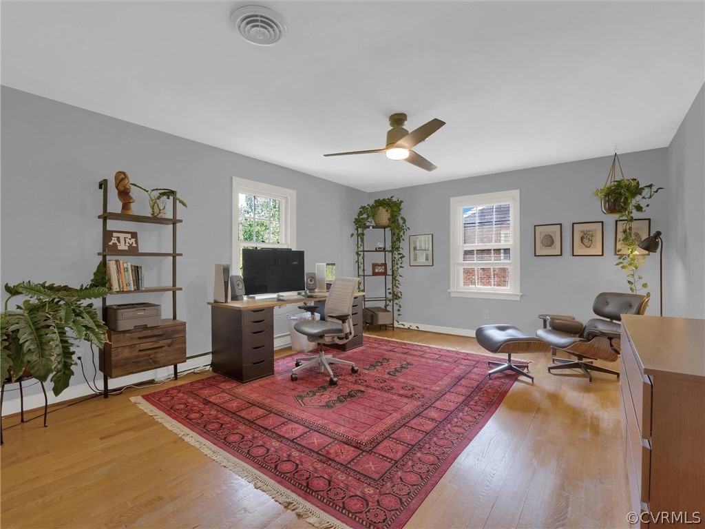 3933 Cresthill Road Chester, VA 23831 - Photo 36 of 49 a living room with furniture and a flat screen tv