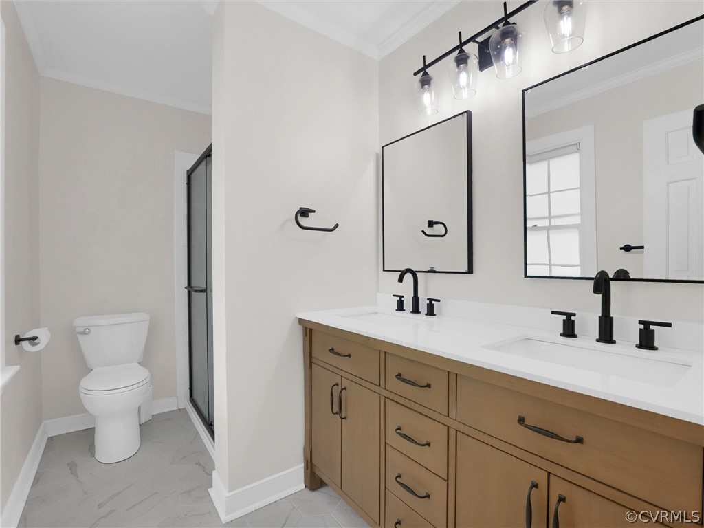 3933 Cresthill Road Chester, VA 23831 - Photo 38 of 49 a bathroom with a toilet sink and mirror