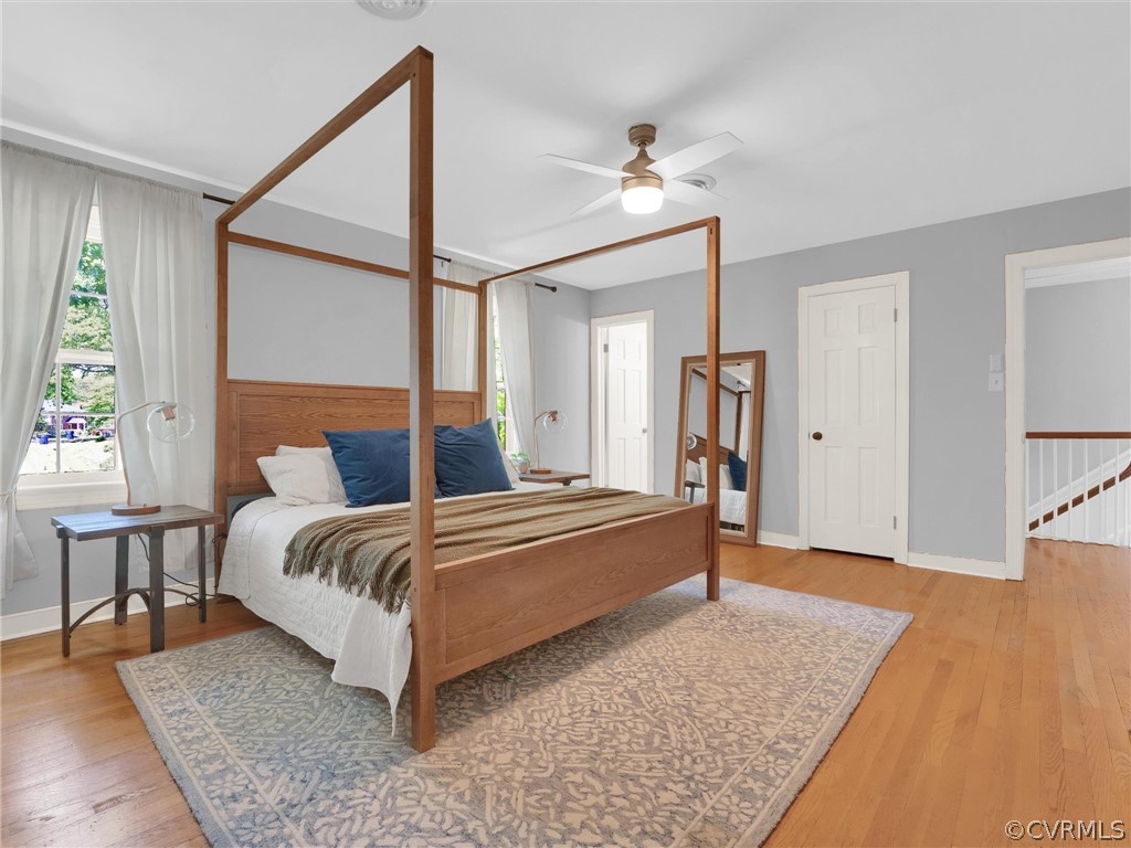 3933 Cresthill Road Chester, VA 23831 - Photo 39 of 49 a bed room with a bed and a chandelier