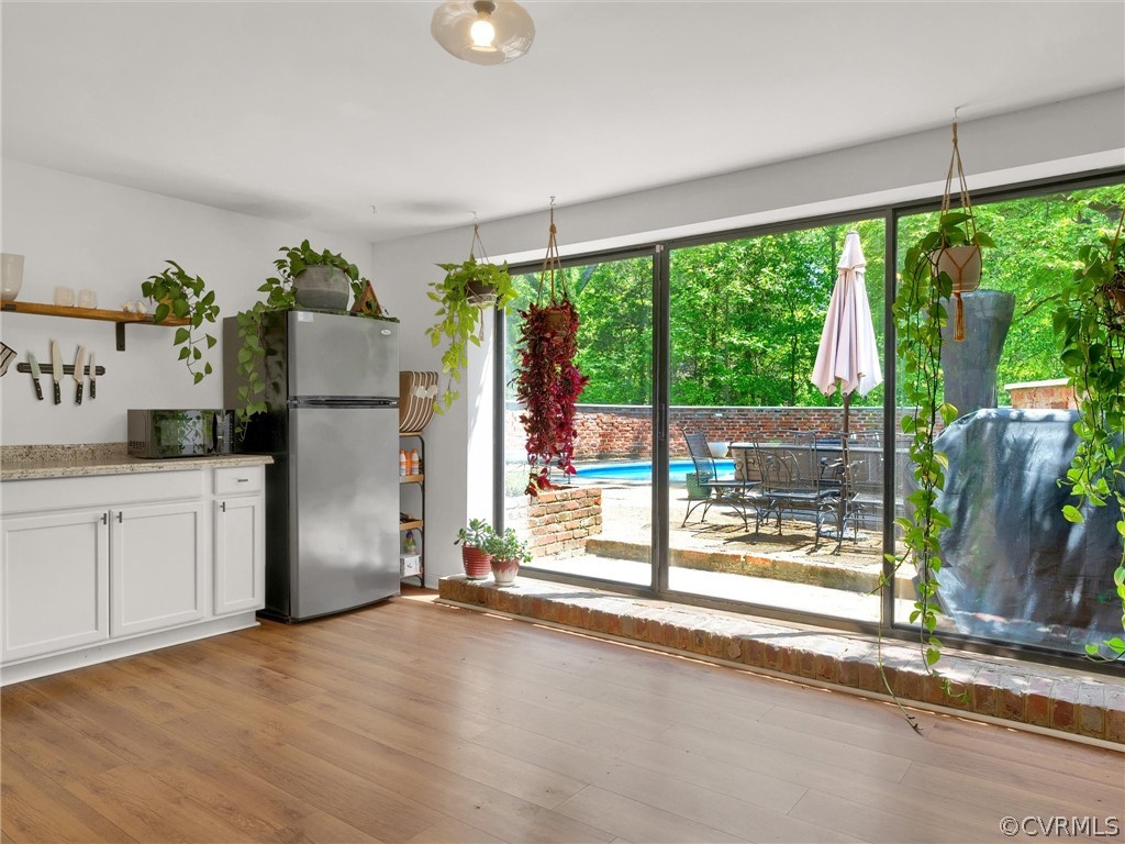 3933 Cresthill Road Chester, VA 23831 - Photo 45 of 49 a view of a kitchen with a sink outdoor appliances and cabinets