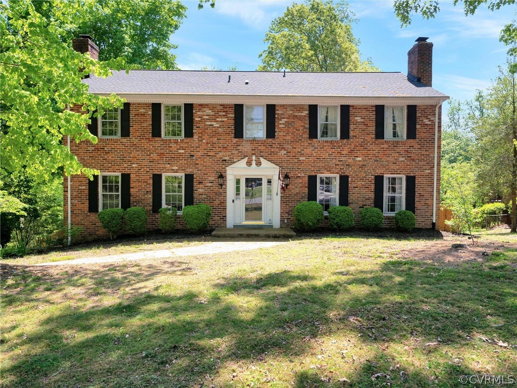 3933 Cresthill Road Chester, VA 23831 - Photo 5 of 49 a front view of a house with yard