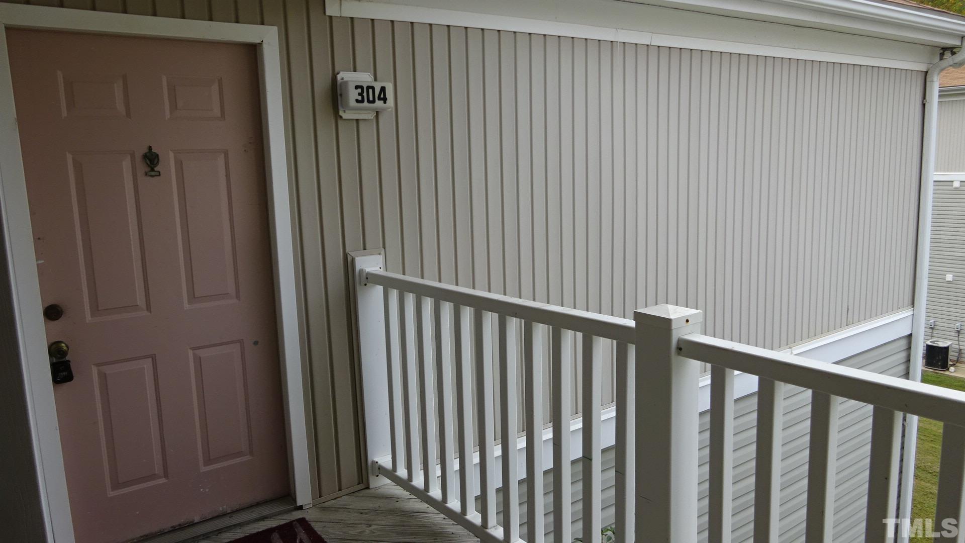 1441 Collegiate Circle, Unit 304 Raleigh, NC 27606 - Photo 3 of 24 a view of a balcony