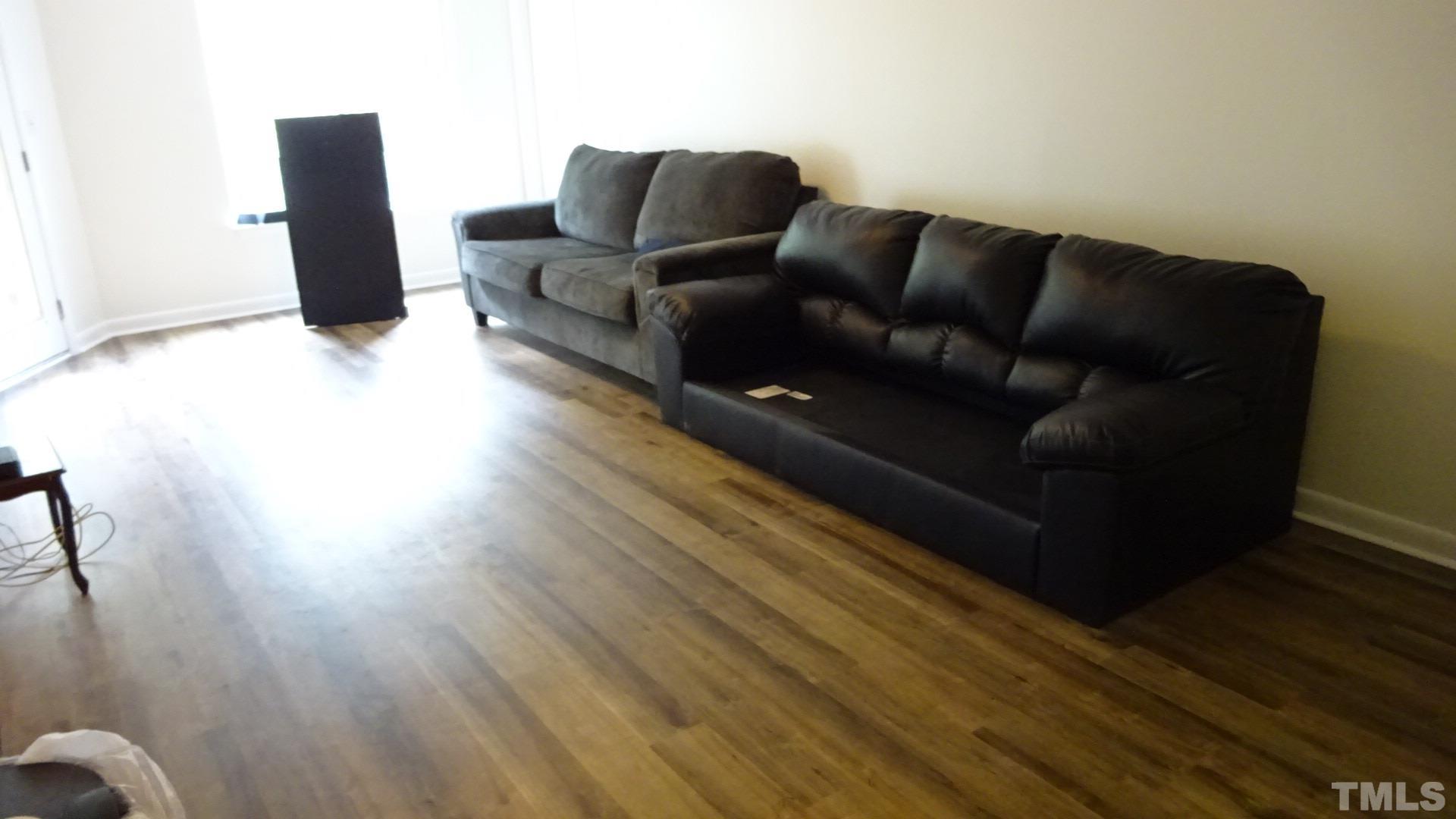 1441 Collegiate Circle, Unit 304 Raleigh, NC 27606 - Photo 6 of 24 a living room with furniture