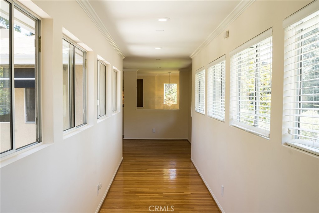 720 Heatherside Road Pasadena, CA 91105 - Photo 11 of 23 a view of a hallway with windows