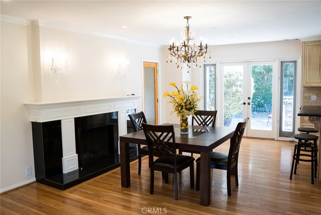 720 Heatherside Road Pasadena, CA 91105 - Photo 13 of 23 a view of a dining room with furniture window and wooden floor