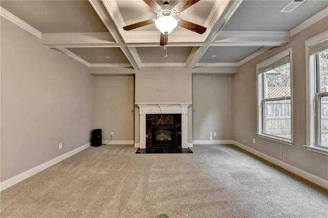 a view of entryway and hall with a front door