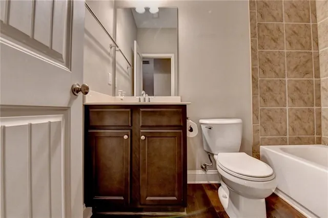 a view of a hallway with windows