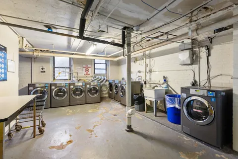 a view of a room with washer and dryer