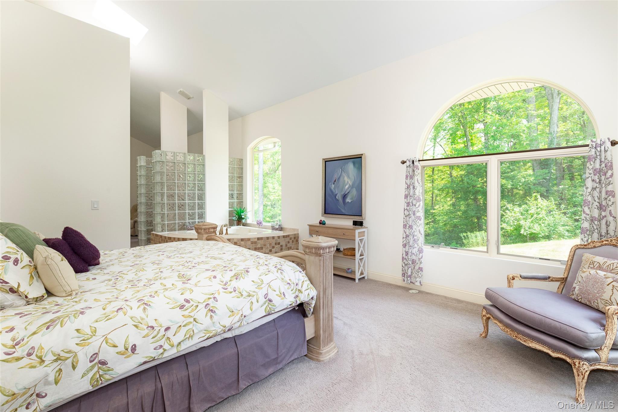 126 Old Hopewell Road Wappingers Falls, NY 12590 - Photo 18 of 38 a bedroom with a bed and large windows