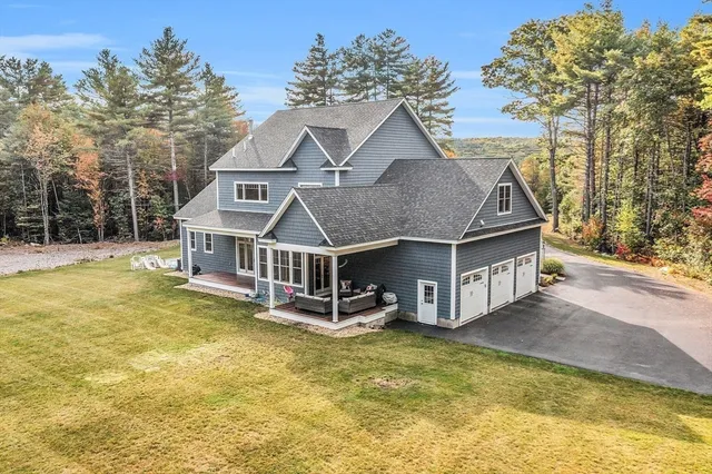 a view of a trees in front of a house