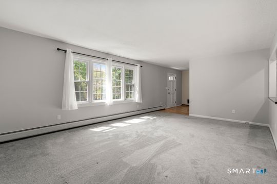 26 Old Coach Road Barkhamsted, CT 06063 - Photo 5 of 35 an empty room with windows