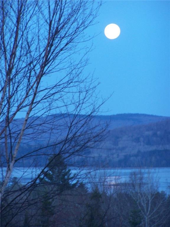 183 Wilsons Mill Road Rangeley, ME 04970 - Photo 10 of 32 full moon over Cupsuptic