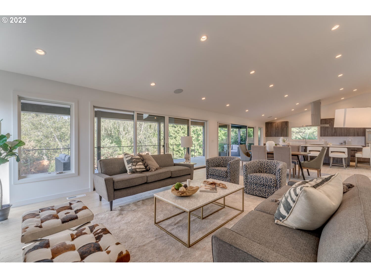 10424 Northwest Laidlaw Road Portland, OR 97229 - Photo 11 of 32 a living room with furniture and a large window