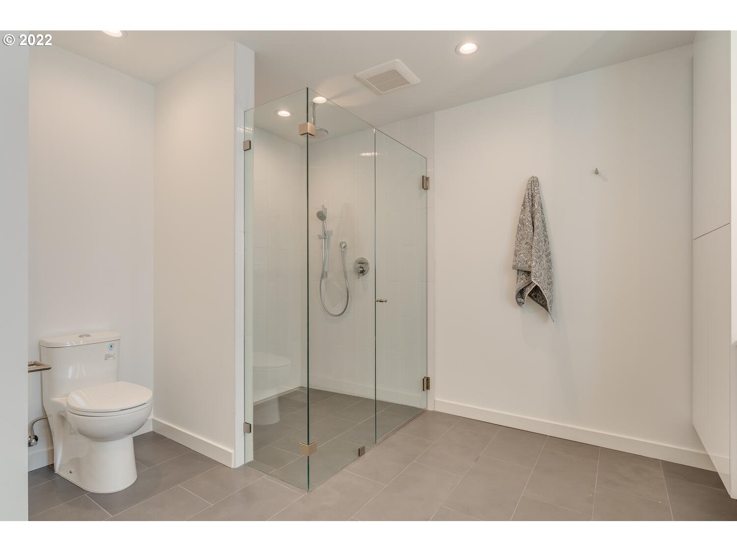 10424 Northwest Laidlaw Road Portland, OR 97229 - Photo 15 of 32 a bathroom with a toilet and a shower