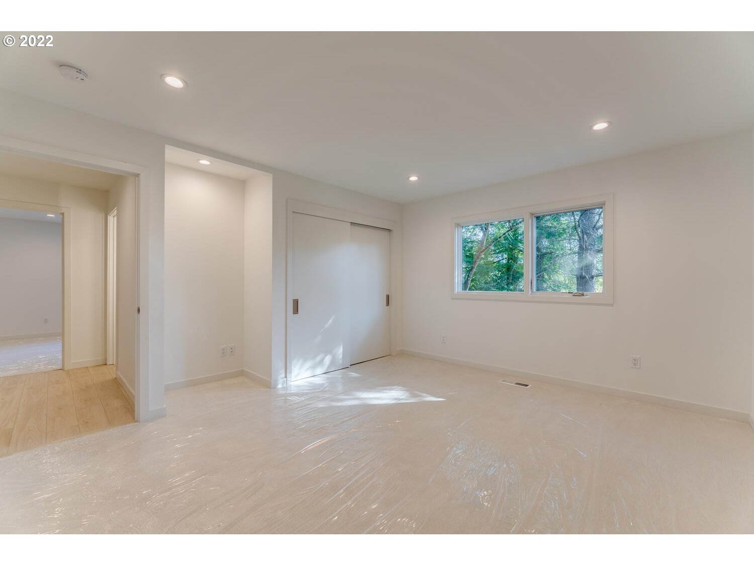 10424 Northwest Laidlaw Road Portland, OR 97229 - Photo 17 of 32 a view of an empty room with a window