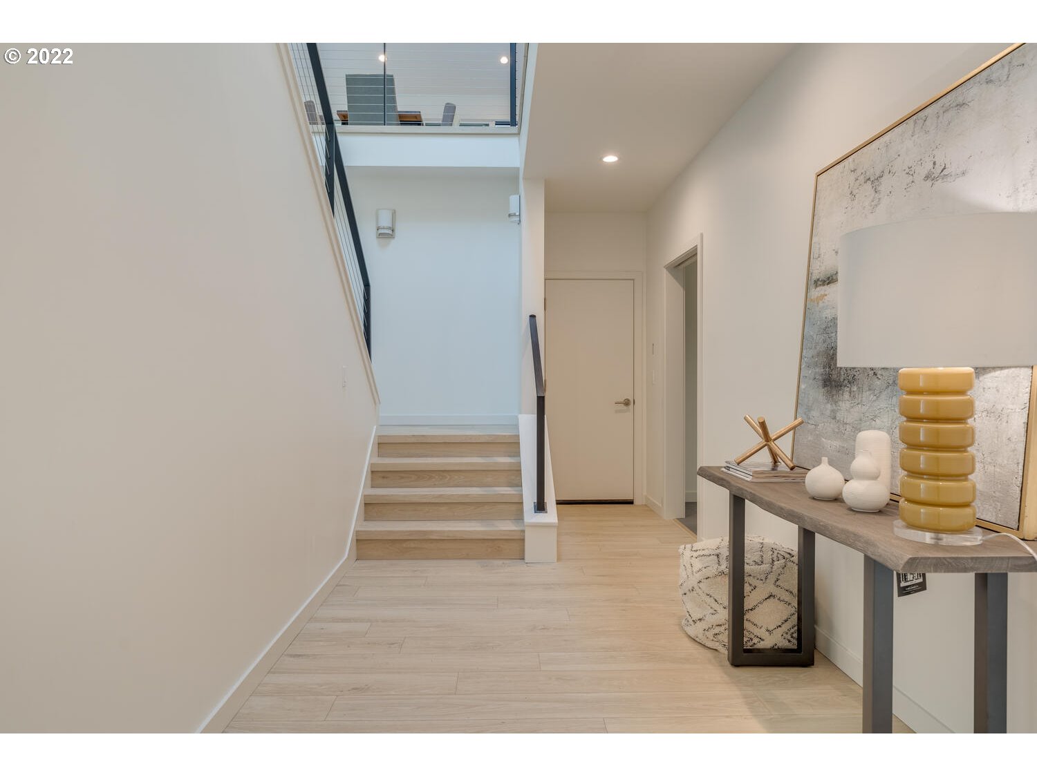 10424 Northwest Laidlaw Road Portland, OR 97229 - Photo 20 of 32 a view of entryway with furniture and wooden floor