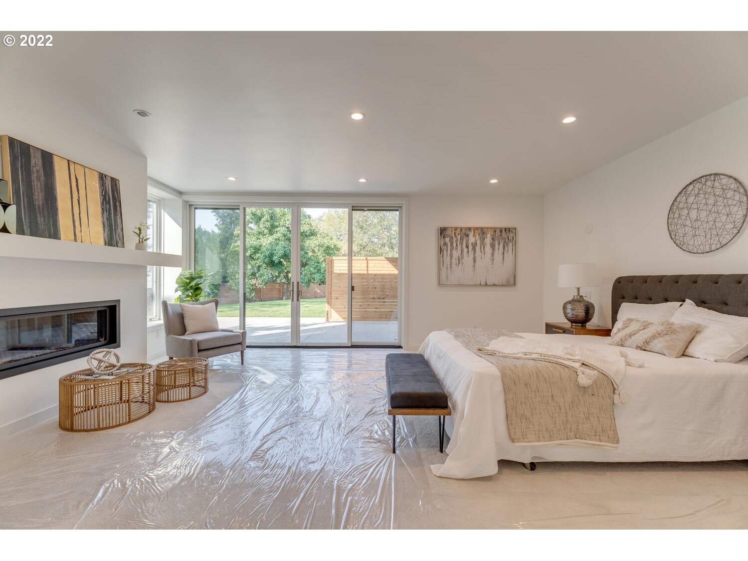 10424 Northwest Laidlaw Road Portland, OR 97229 - Photo 22 of 32 a living room with furniture a fireplace and a large window