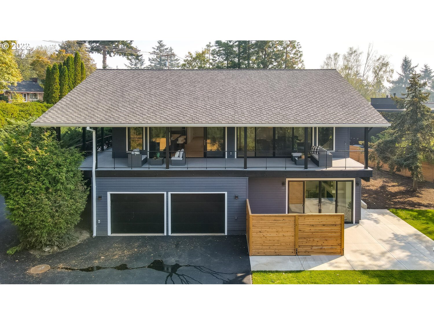 10424 Northwest Laidlaw Road Portland, OR 97229 - Photo 28 of 32 a aerial view of a house with a yard and garage