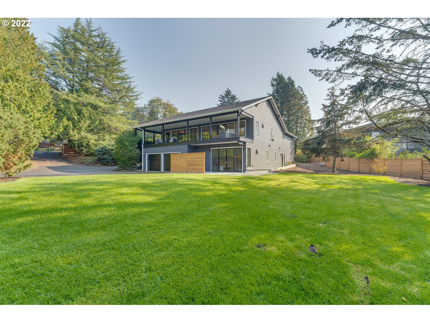 10424 Northwest Laidlaw Road Portland, OR 97229 - Photo 30 of 32 a front view of house with yard and green space