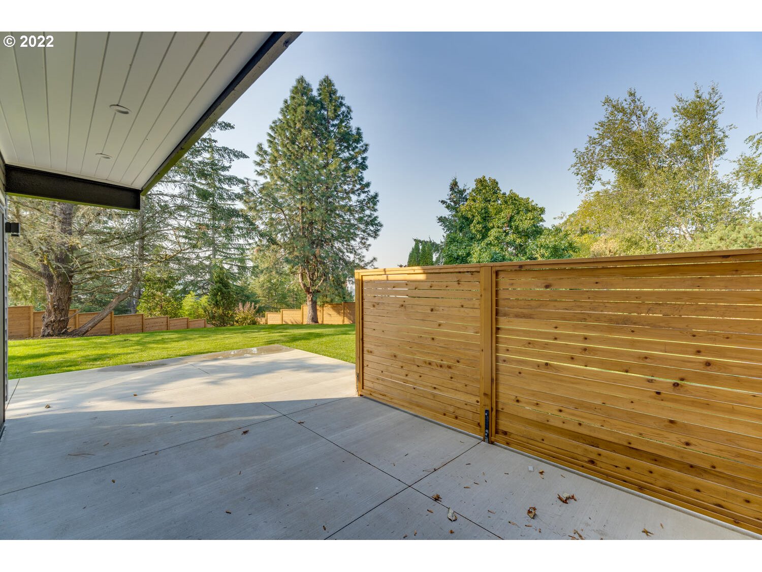 10424 Northwest Laidlaw Road Portland, OR 97229 - Photo 32 of 32 a view of a room with wooden stairs
