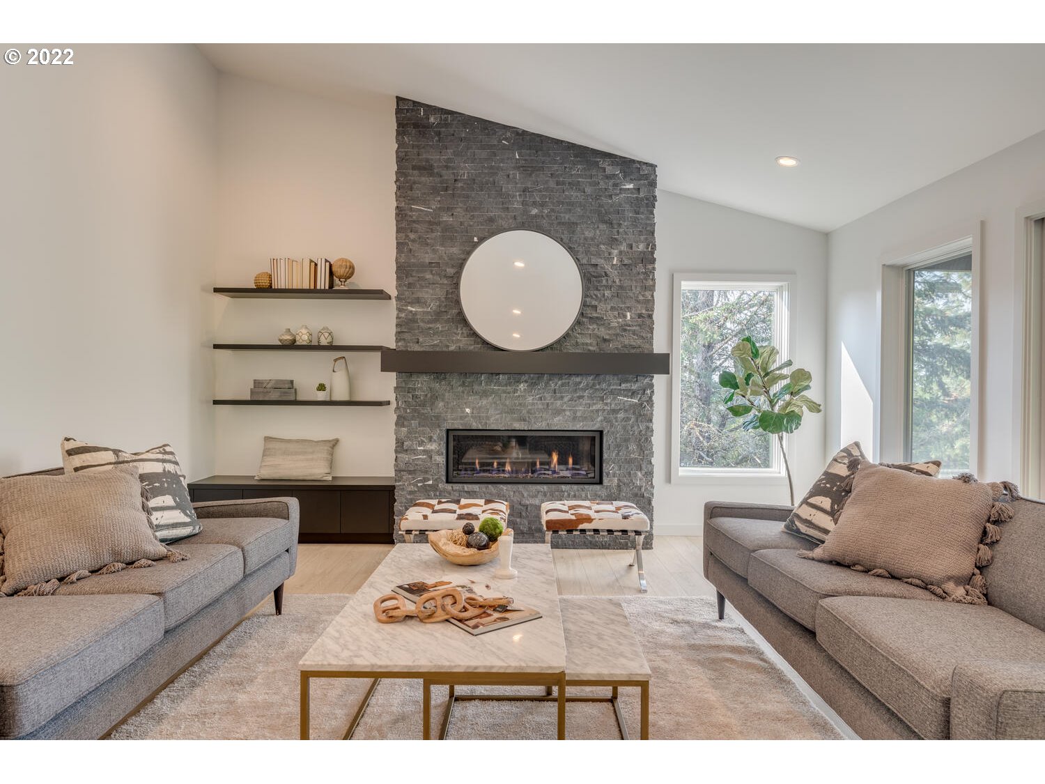 10424 Northwest Laidlaw Road Portland, OR 97229 - Photo 9 of 32 a living room with furniture and a fireplace