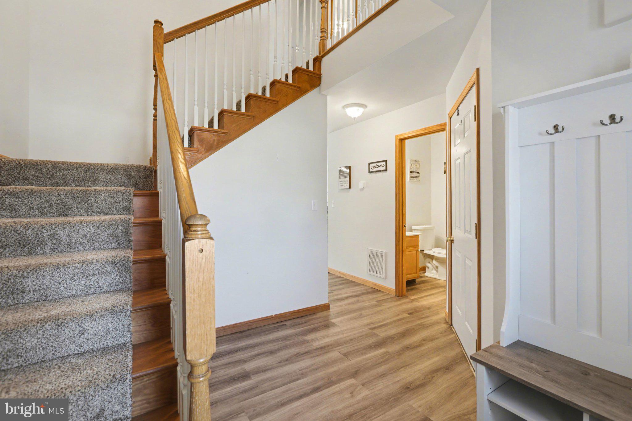 134 Sable Drive Carlisle, PA 17013 - Photo 12 of 37 a view of entryway and hall with wooden floor