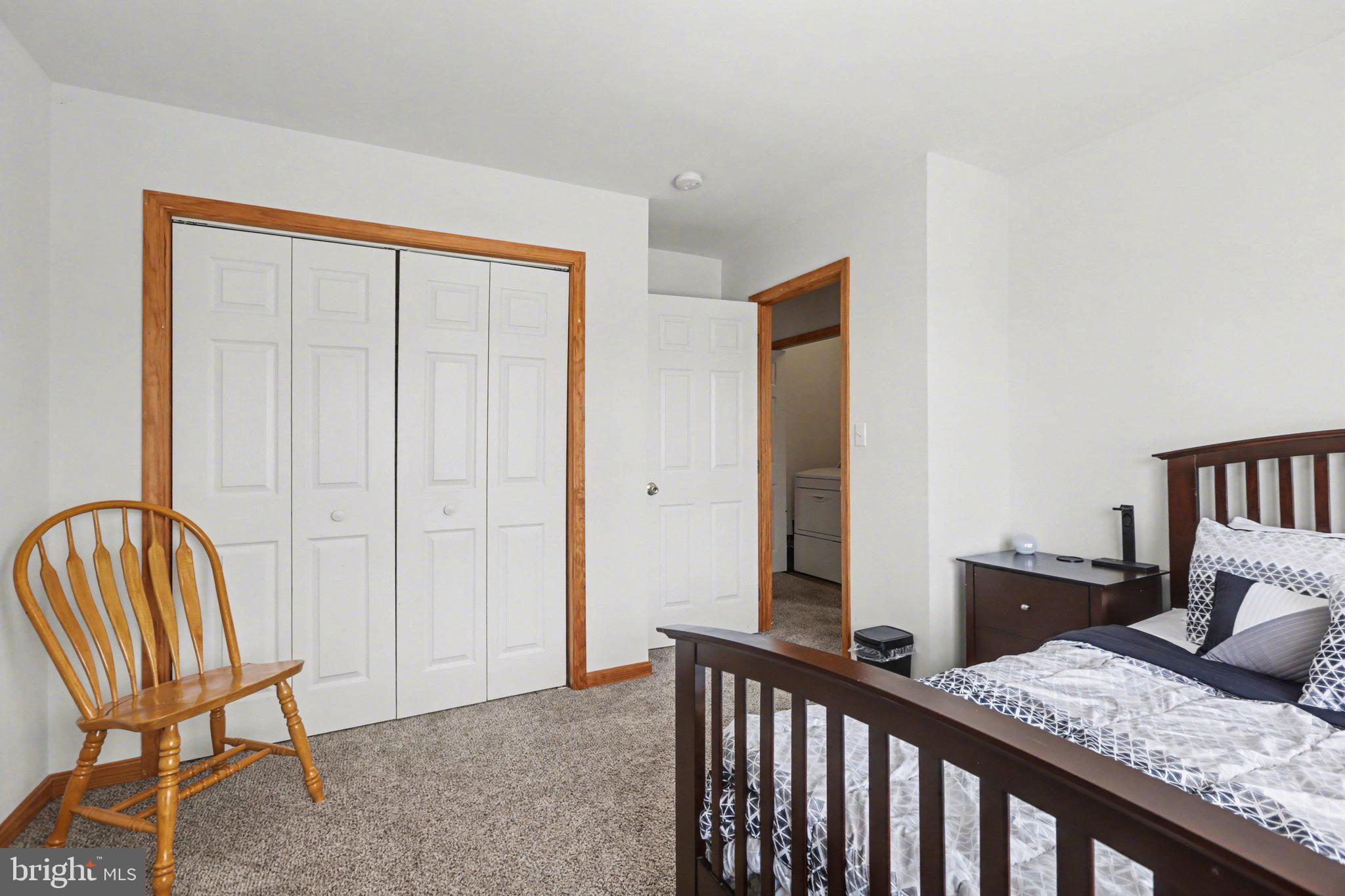134 Sable Drive Carlisle, PA 17013 - Photo 19 of 37 a bedroom with a bed and wooden floor