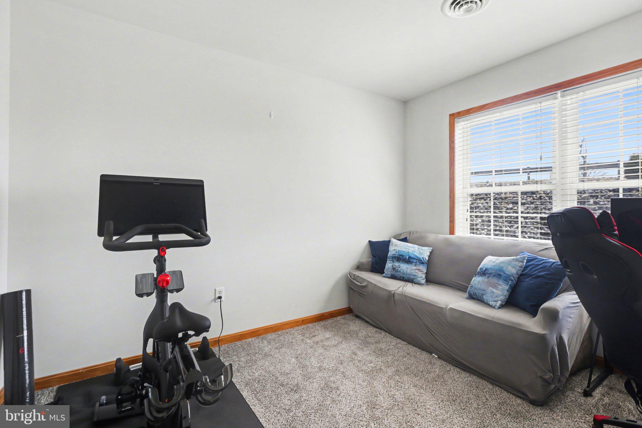 134 Sable Drive Carlisle, PA 17013 - Photo 22 of 37 a living room with furniture and a flat screen tv