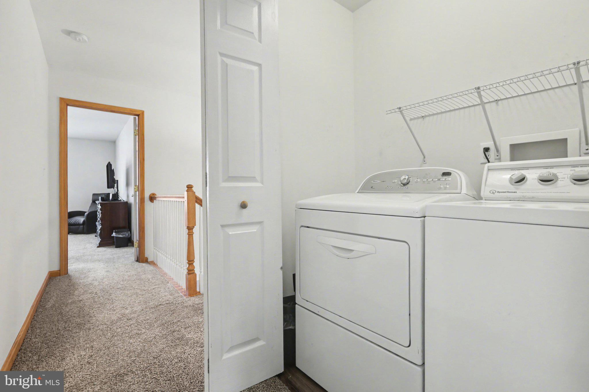 134 Sable Drive Carlisle, PA 17013 - Photo 26 of 37 a view of a storage & utility room with dryer and washer