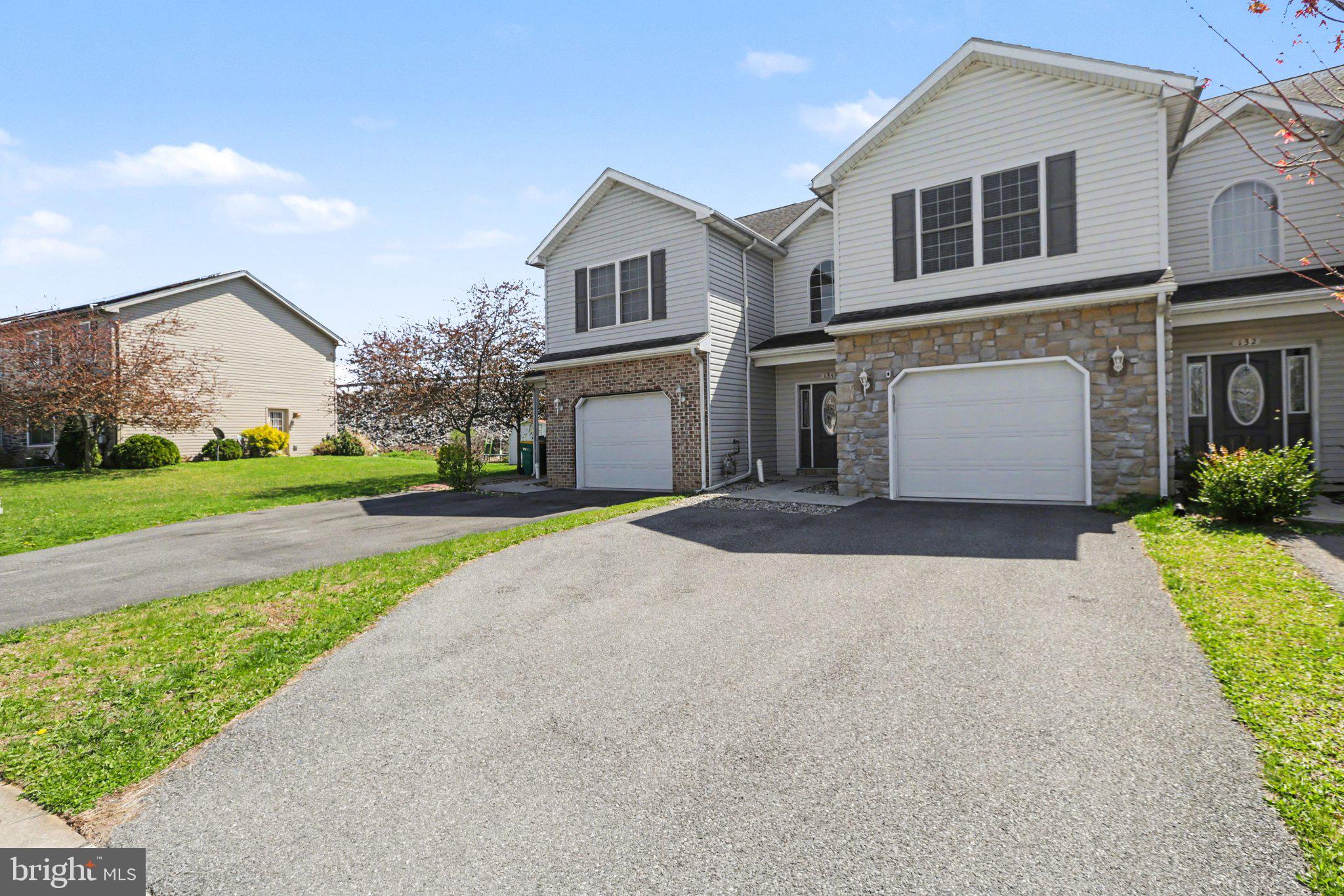134 Sable Drive Carlisle, PA 17013 - Photo 29 of 37 a front view of a house with a yard and garage