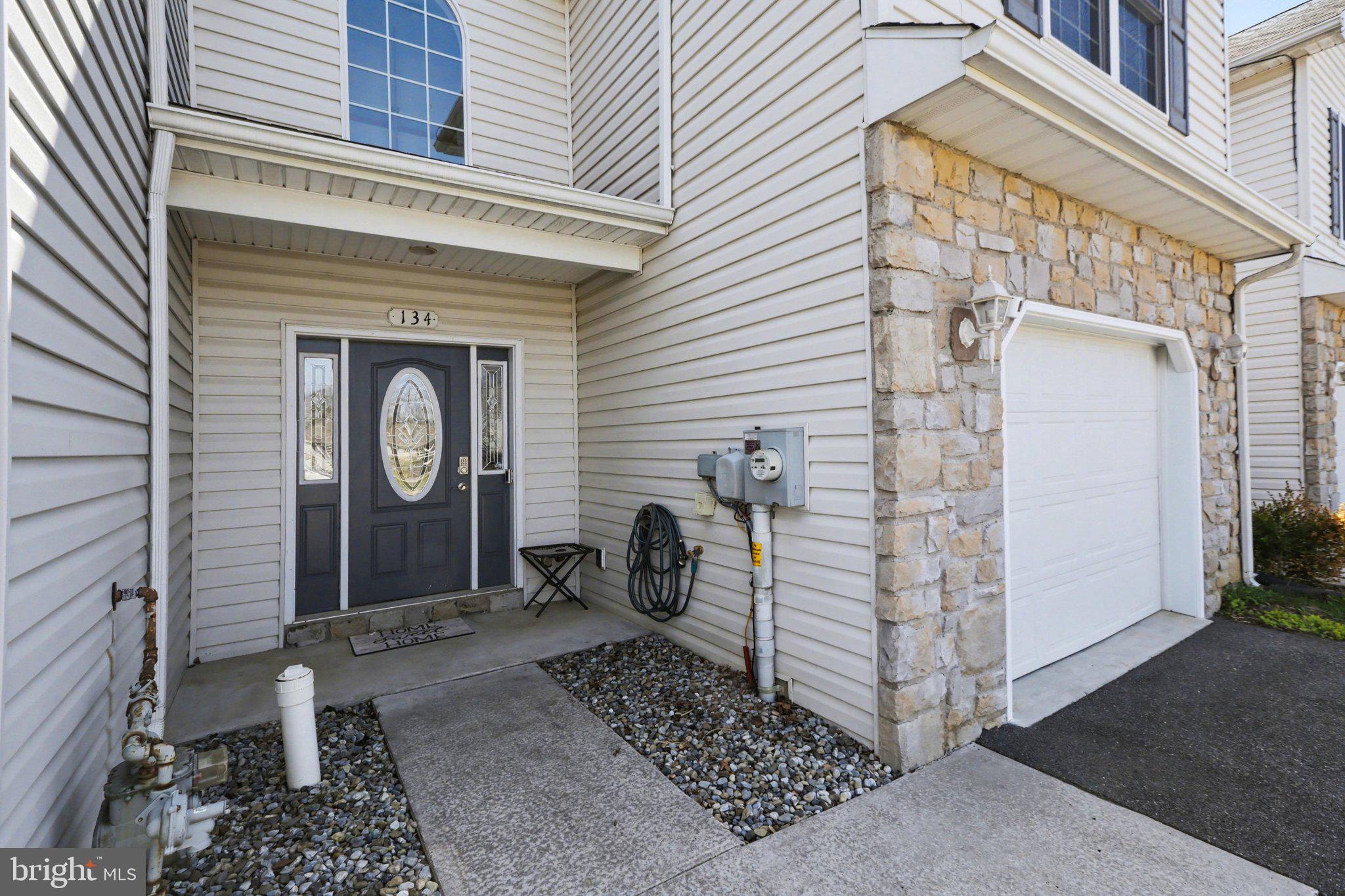 134 Sable Drive Carlisle, PA 17013 - Photo 30 of 37 a front view of a house with garden