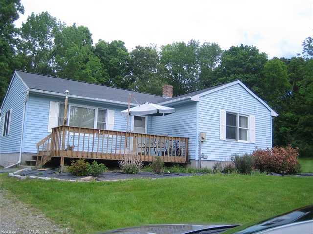 152 Green Hollow Road Killingly, CT 06239 - Photo 1 of 1 a view of a house with a yard and deck
