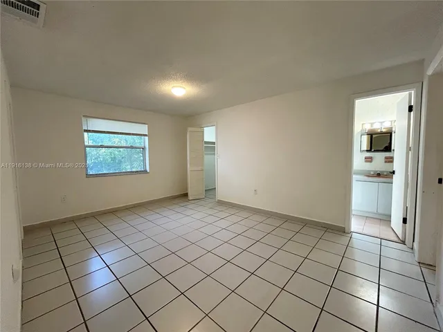 a view of a room and window