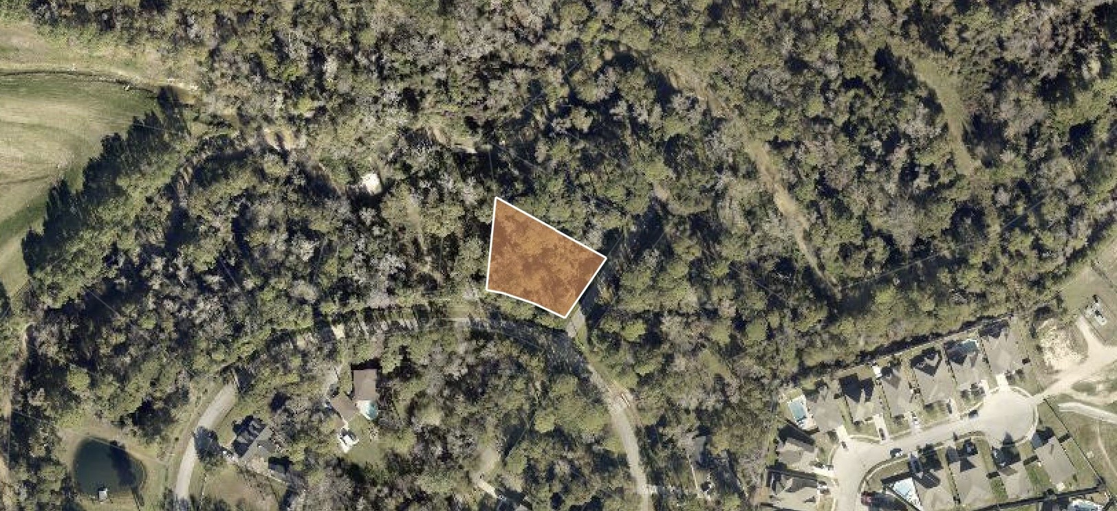 0 Creek Wood Drive Spring, TX 77389 - Photo 1 of 3 a view of a yard with a tree