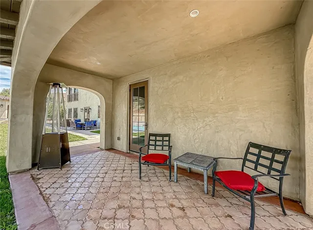 a living room with furniture and a couch