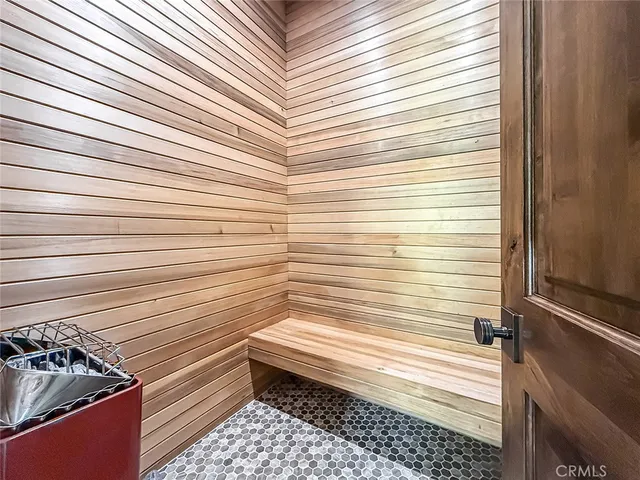 a view of a swimming pool with a yard