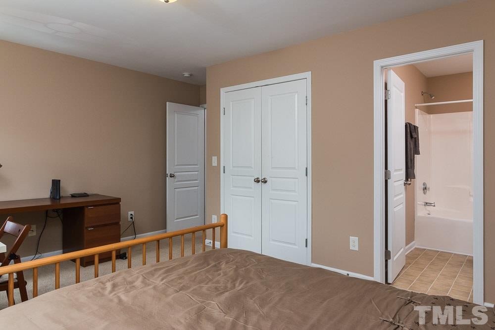 7839 Silverthread Lane Raleigh, NC 27617 - Photo 16 of 23 a view of a hallway with closet