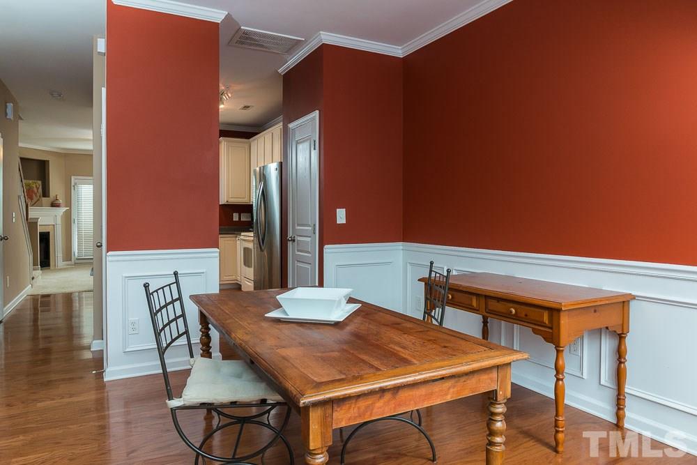 7839 Silverthread Lane Raleigh, NC 27617 - Photo 3 of 23 a view of a dining room with furniture