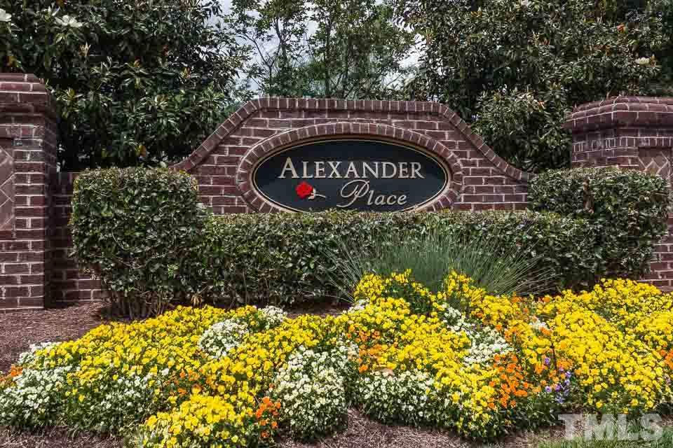 7839 Silverthread Lane Raleigh, NC 27617 - Photo 22 of 23 a view of sign board with buildings in the background