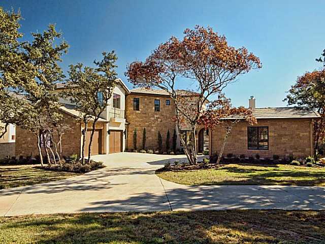 a view of swimming pool with an trees