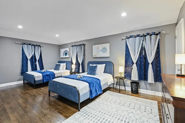 a bedroom with a bed and a couch