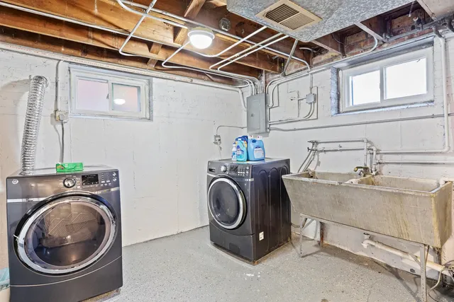 a utility room with dryer and washer